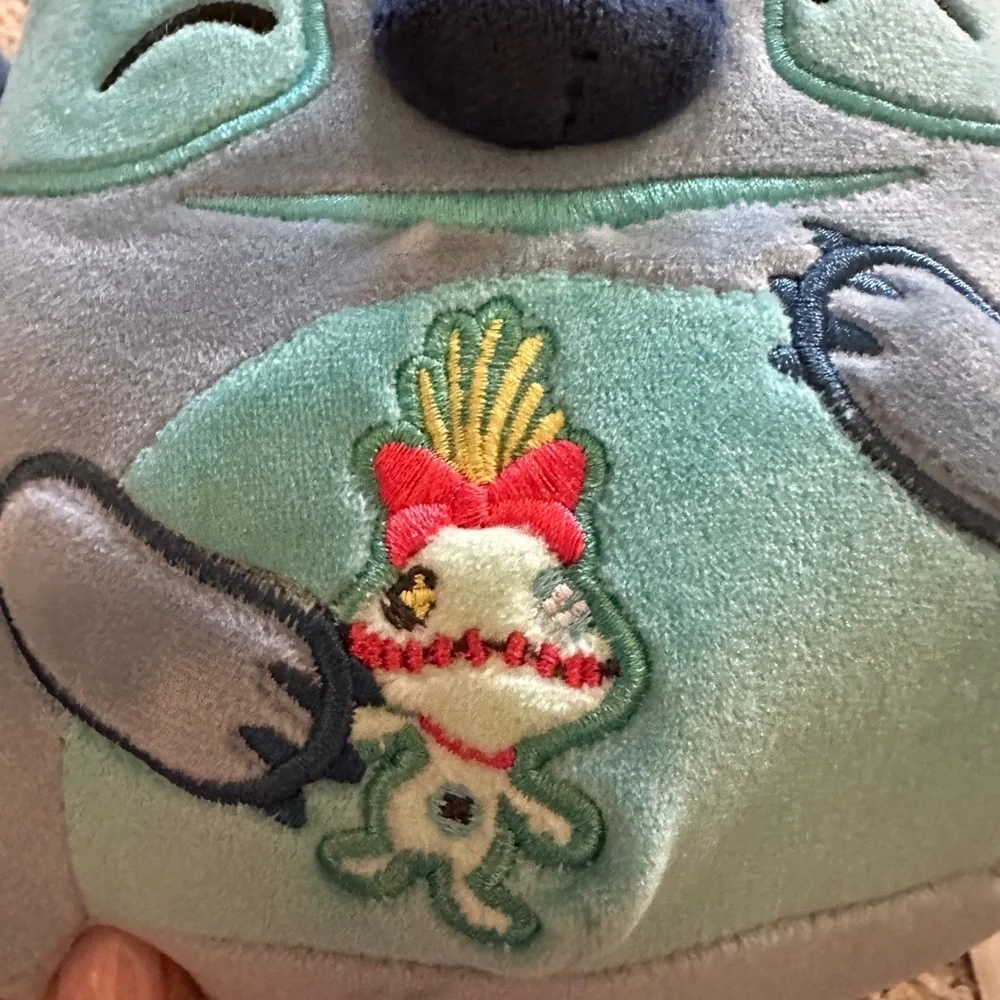 Disney Stitch holding Scrump